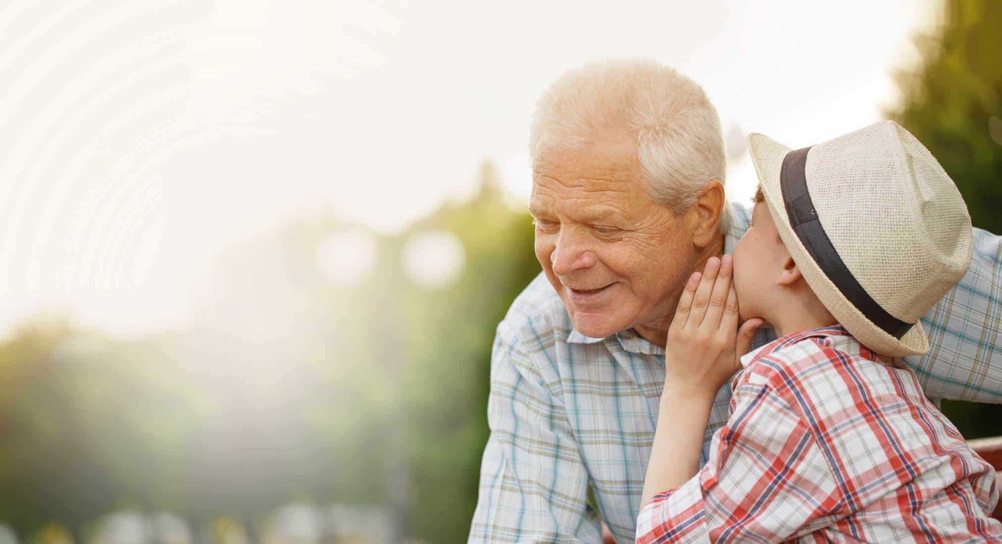 little boy talking with grandad little boy talking with grandad